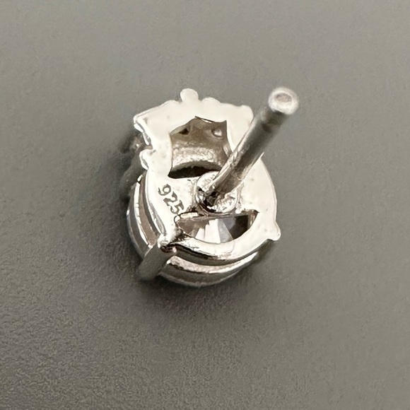 Sterling Silver 1/2 c.t. Stud Earrings - Picture 7 of 16